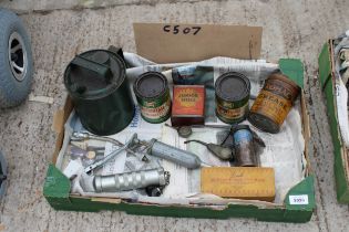 AN ASSORTMENT OF VINTAGE OIL CANS AND GREASE GUNS ETC