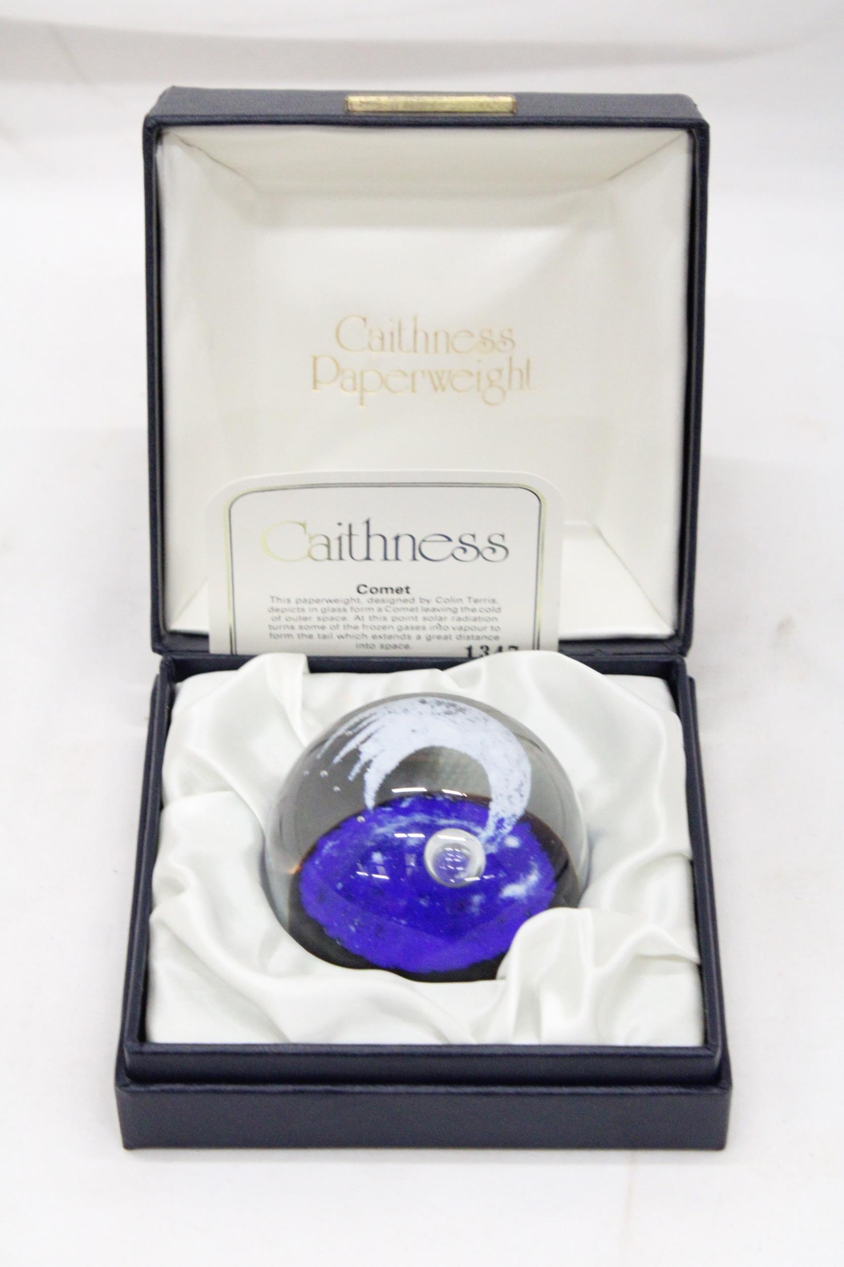 A BOXED CAITHNESS, LIMITED EDITION, 1347/3000, 'COMET' PAPERWEIGHT