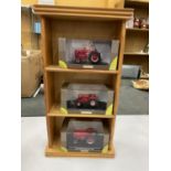 THREE BOXED UNIVERSAL HOBBIES MODEL TRACTORS SCALE 1:43 TO INCLUDED THREE TIER WOODEN DISPLAY UNIT