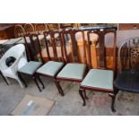 A SET OF FOUR MAHOGANY QUEEN-ANNE STYLE DINING CHAIRS