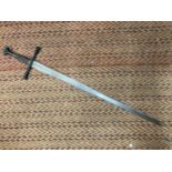 A KING CARLOS V HEAVY LONG SWORD WITH ORNATE BLADE OF TOLEDO STEEL - APPROXIMATELY 104CM