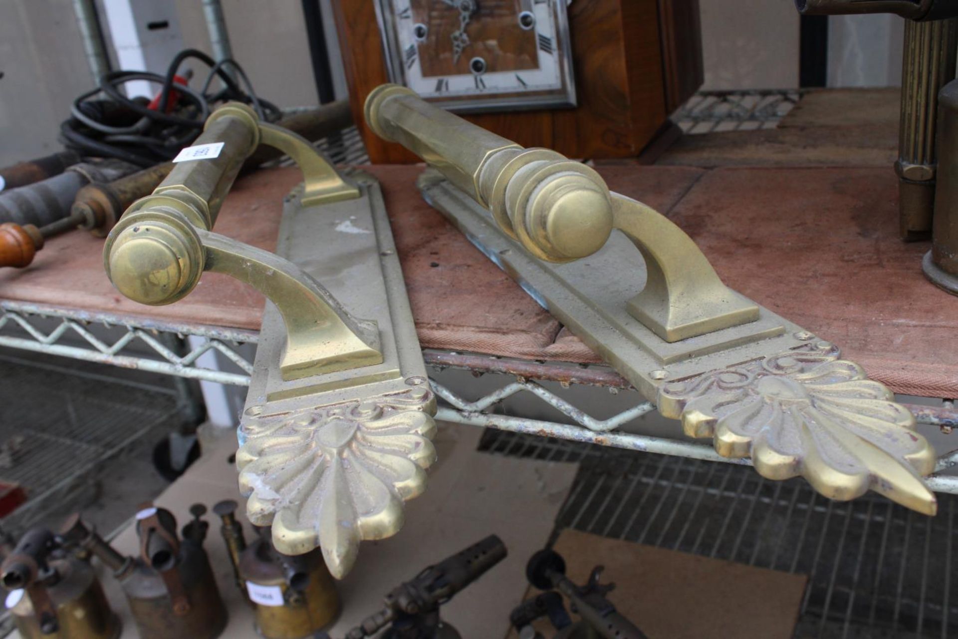 A PAIR OF LARGE VINTAGE BRASS DOOR HANDLES - Image 2 of 2