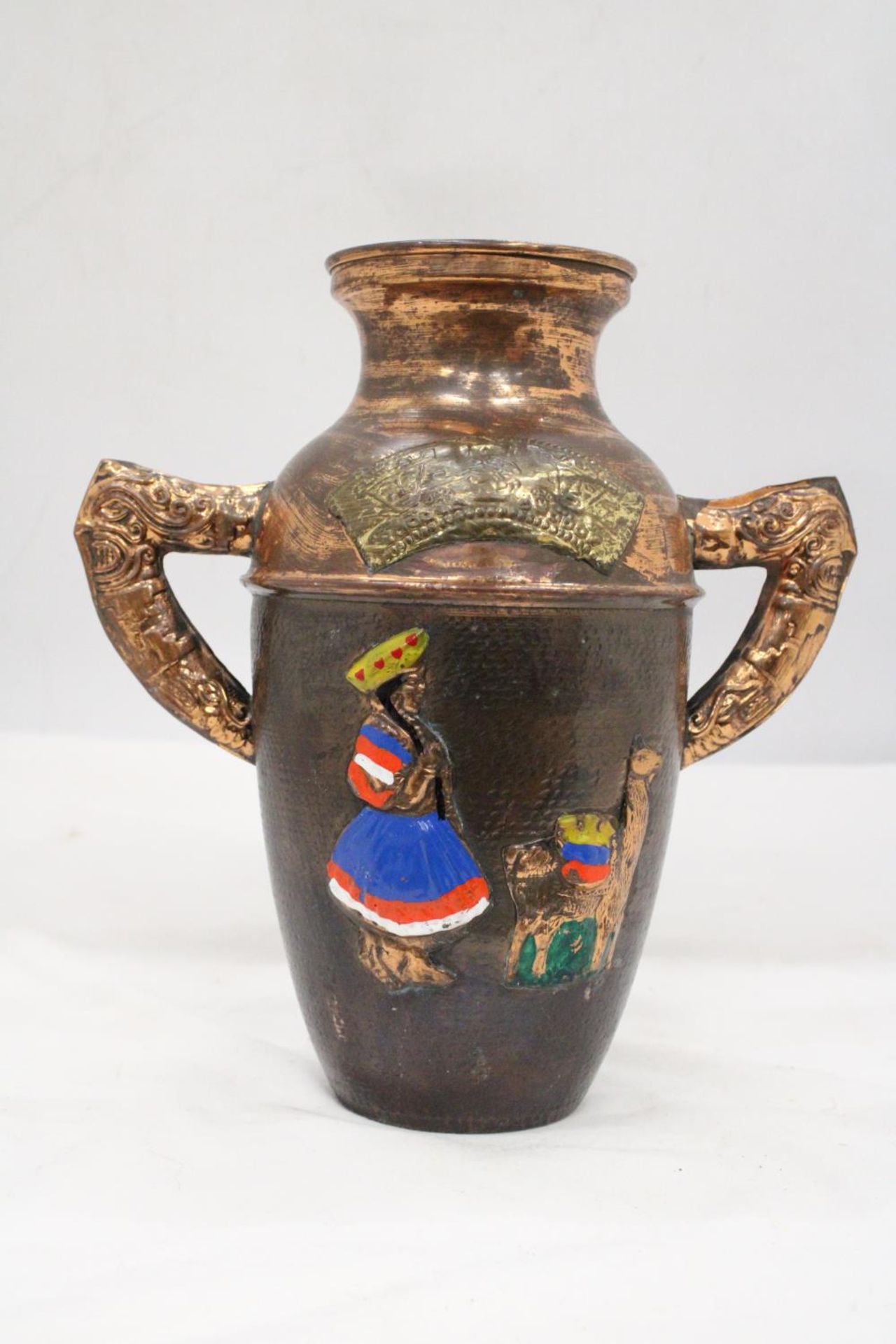 A VINTAGE COLOMBIAN MAYAN DECORATED COPPER VASE