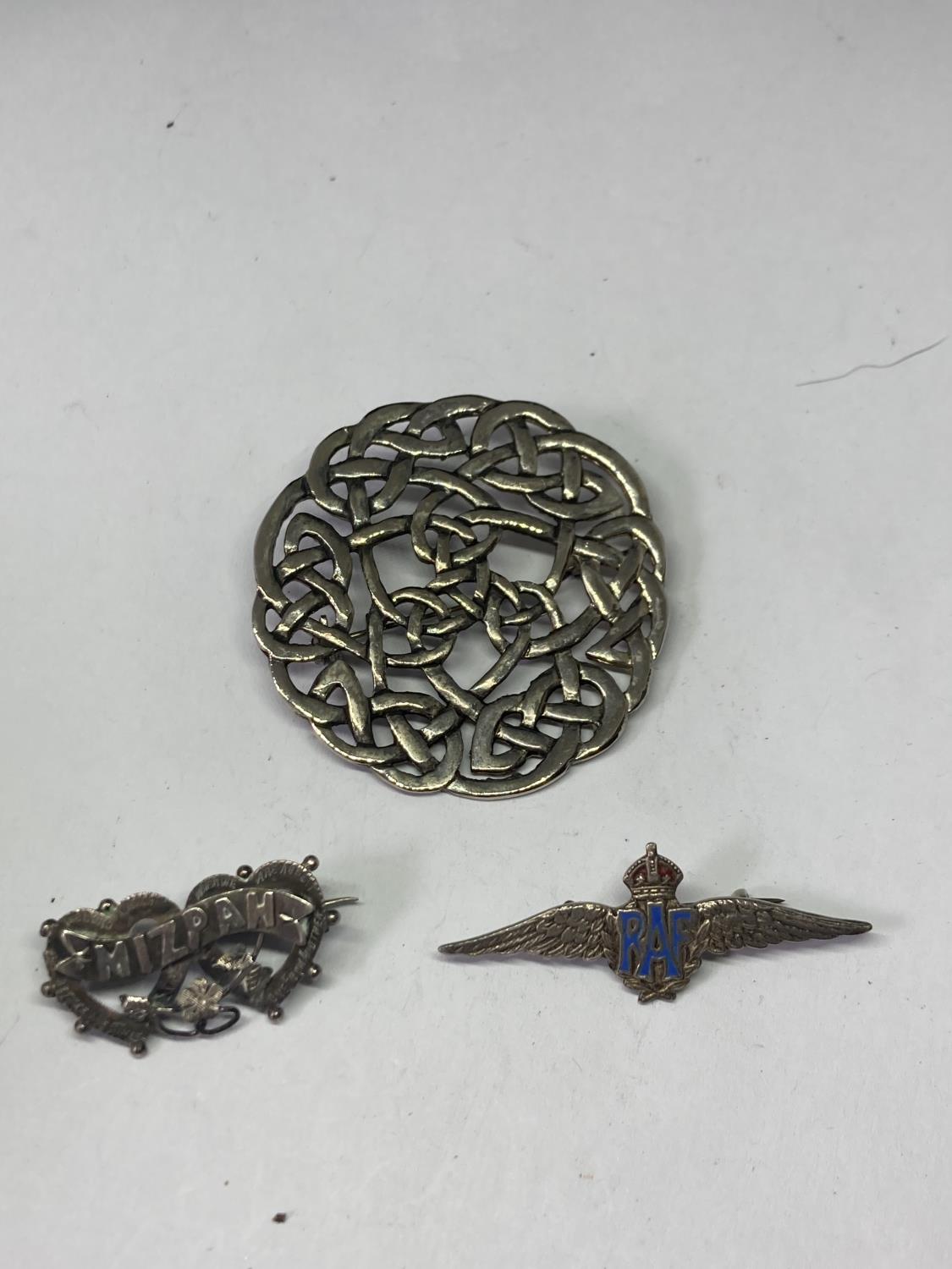 THREE SILVER BROOCHES