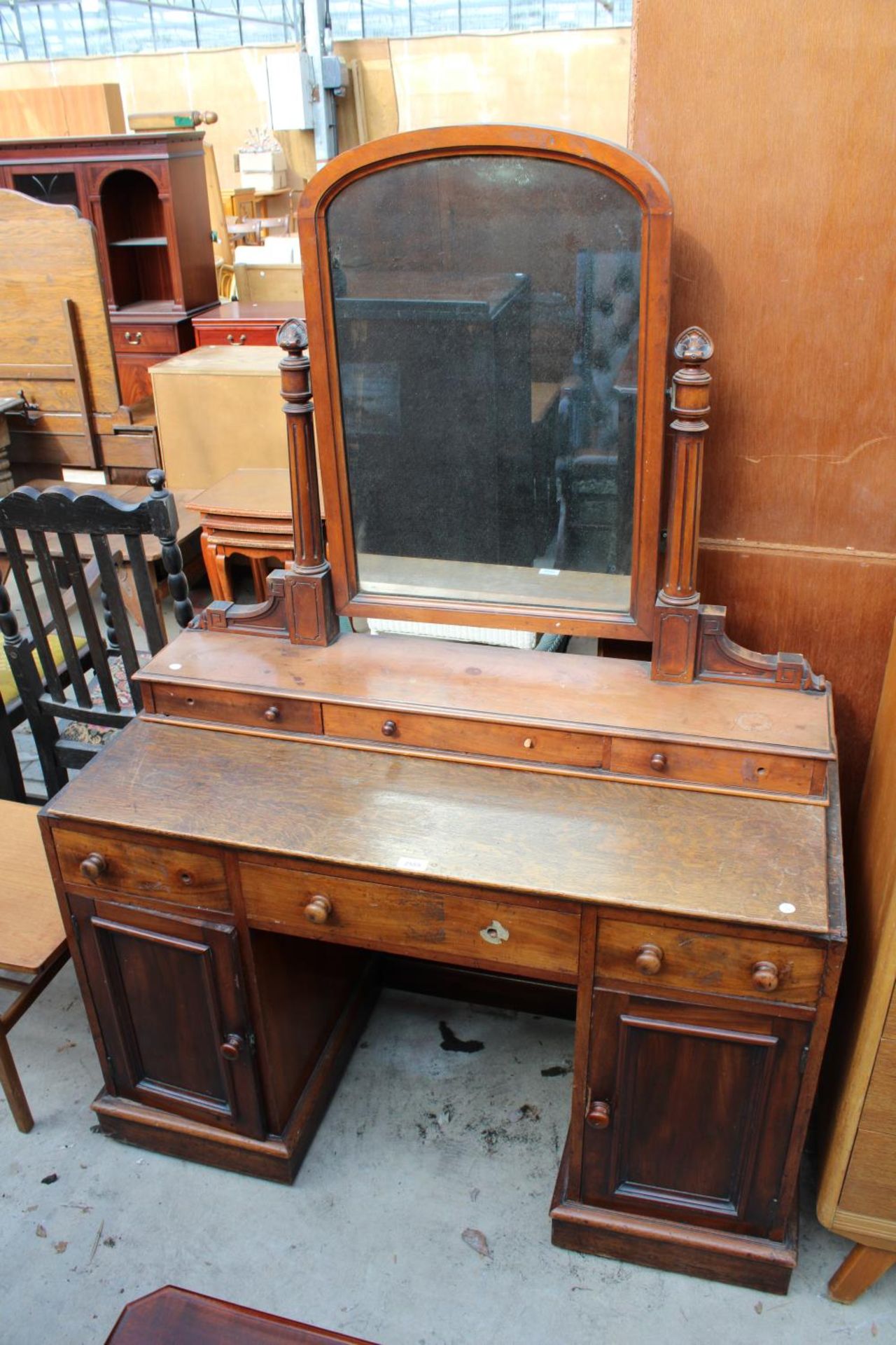 A VICTORIAN MAHOGANY KNEE-HOLE DRESSING TABLE WITH OAK TOP, 44" WIDE