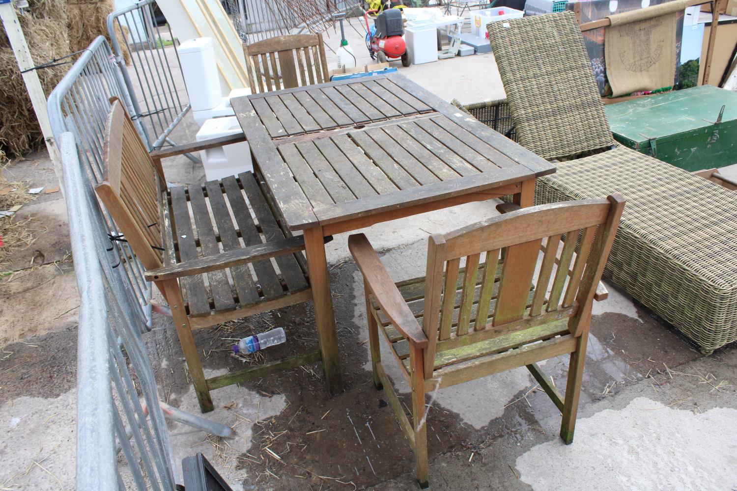 A TEAK GARDEN TABLE WITH A BENCH AND TWO CHAIRS - Image 4 of 6