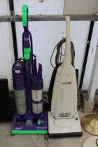 A DYSON DC03 ZORB VACUUM CLEANER AND A FURTHER PANASONIC VACUUM CLEANER