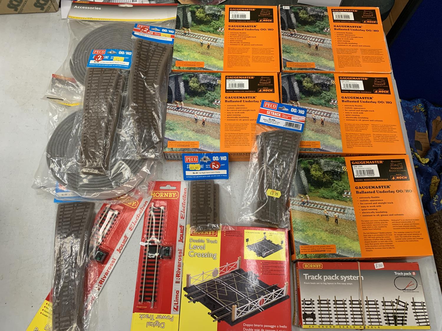SEVEN BOXED KITS FOR RAILWAYS TO INCLUDE DOUBLE TRACK LEVEL CROSSING, BALLASTED UNDERLAY AND FURTHER