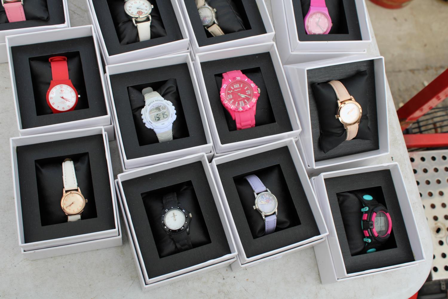 AN ASSORTMENT OF BOXED FASHION WATCHES - Image 3 of 3