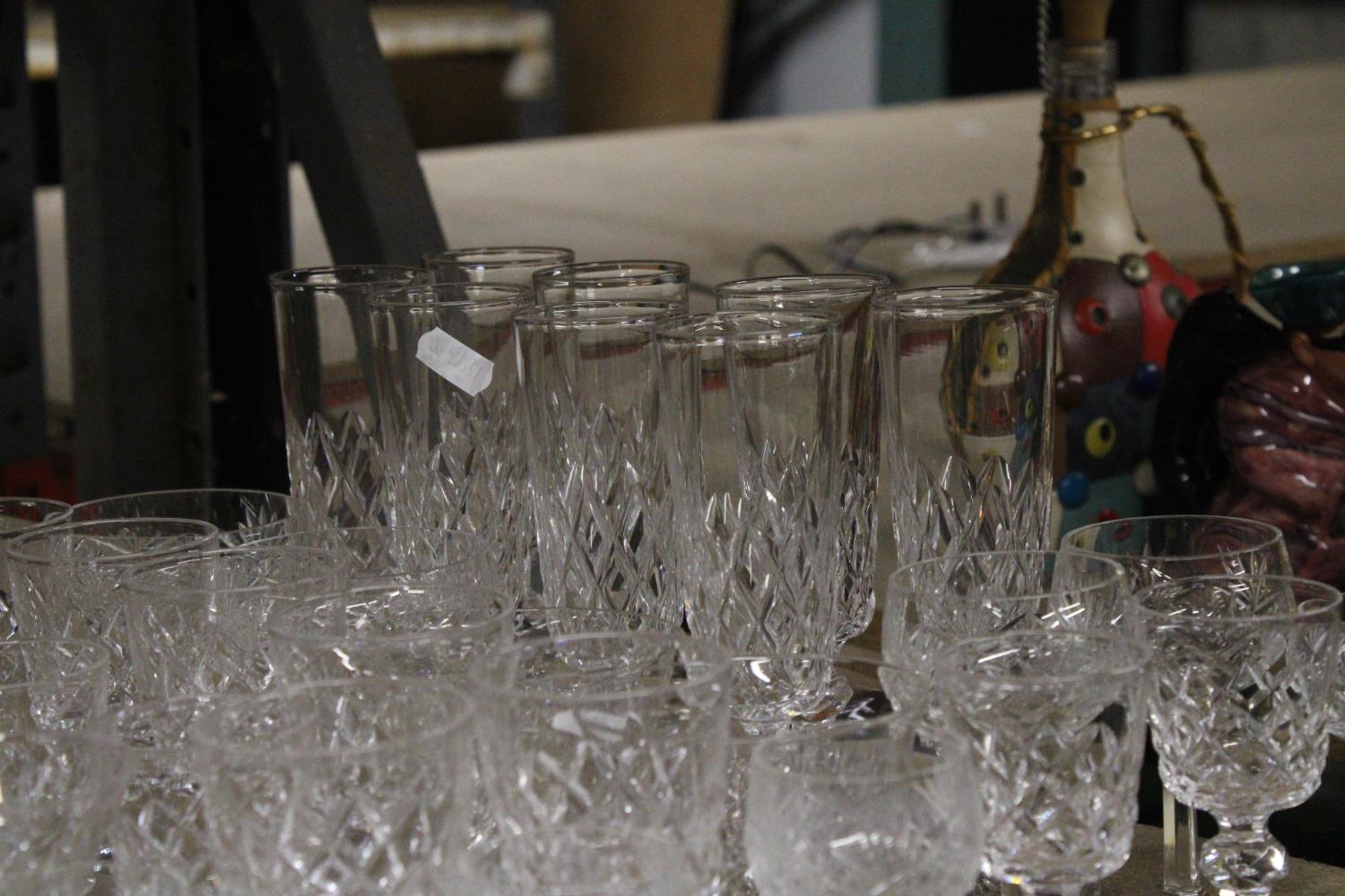 A QUANTITY OF CUT GLASS GLASSES TO INCLUDE CHAMPAGNE FLUTES, WHISKY, WINE, SHERRY, PORT, ETC - Image 3 of 5
