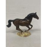 A RARE BESWICK GALLOPING BROWN HORSE BAY HORSE MODEL NO. 1374