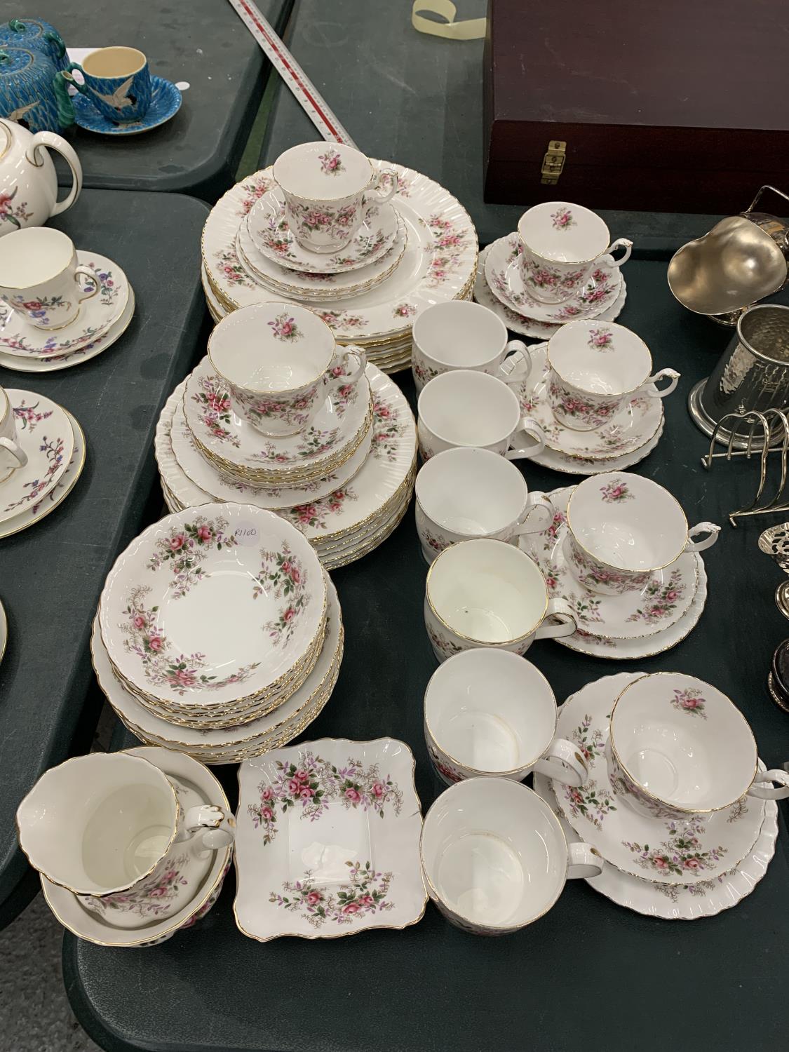 A QUANTITY OF ROYAL ALBERT 'LAVENDER ROSE' CHINA TO INCLUDE, VARIOUS SIZES OF PLATES, A CREAM JUG,