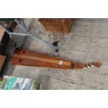 A WOODEN THREE STIRNG INSTRUMENT FOR RESTORATION