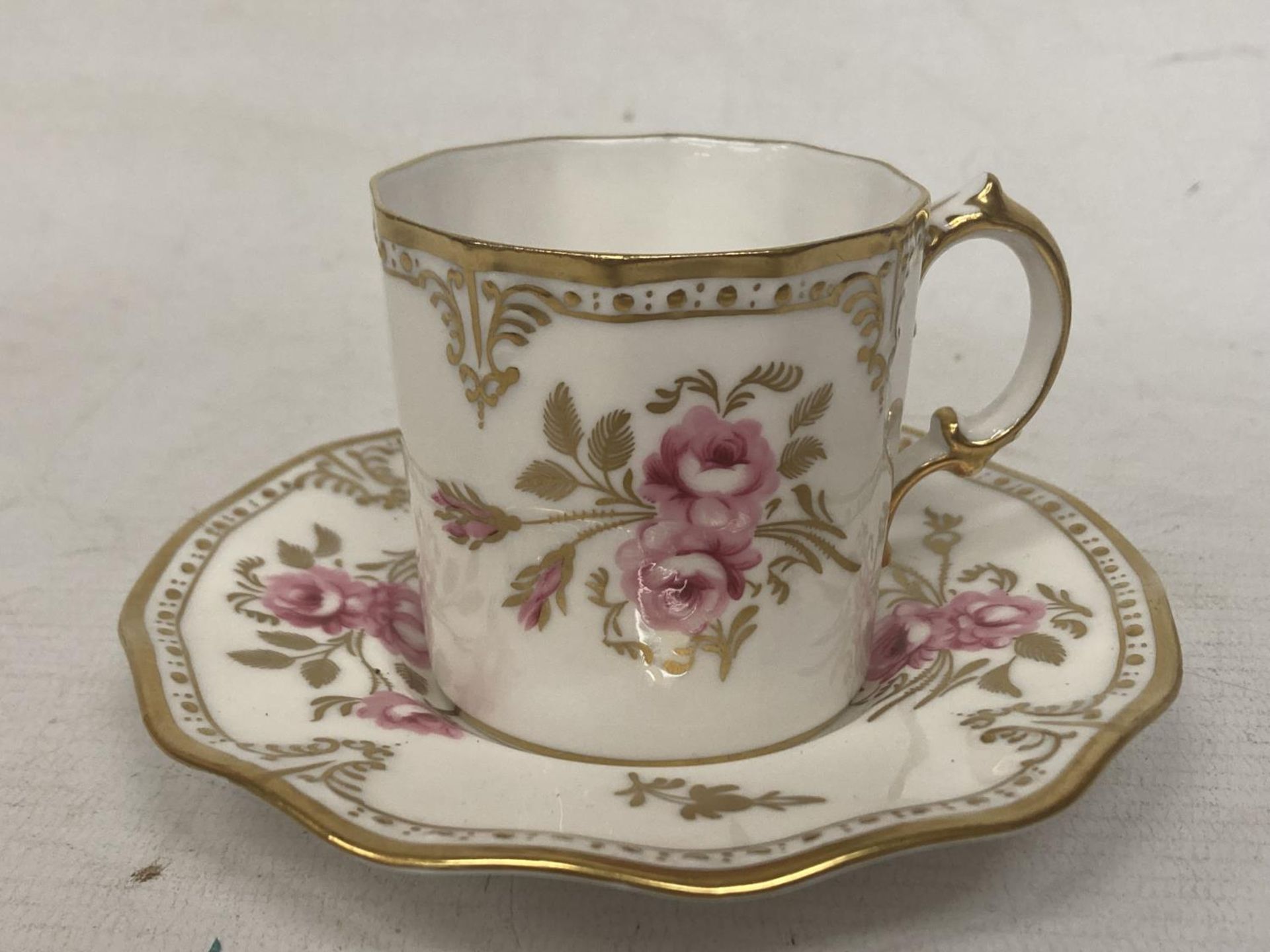 A ROYAL CROWN DERBY PINXTON ROSES COFFEE CAN AND SAUCER TOGETHER WITH A ROYAL CROWN DERBY TEACUP AND - Image 2 of 6