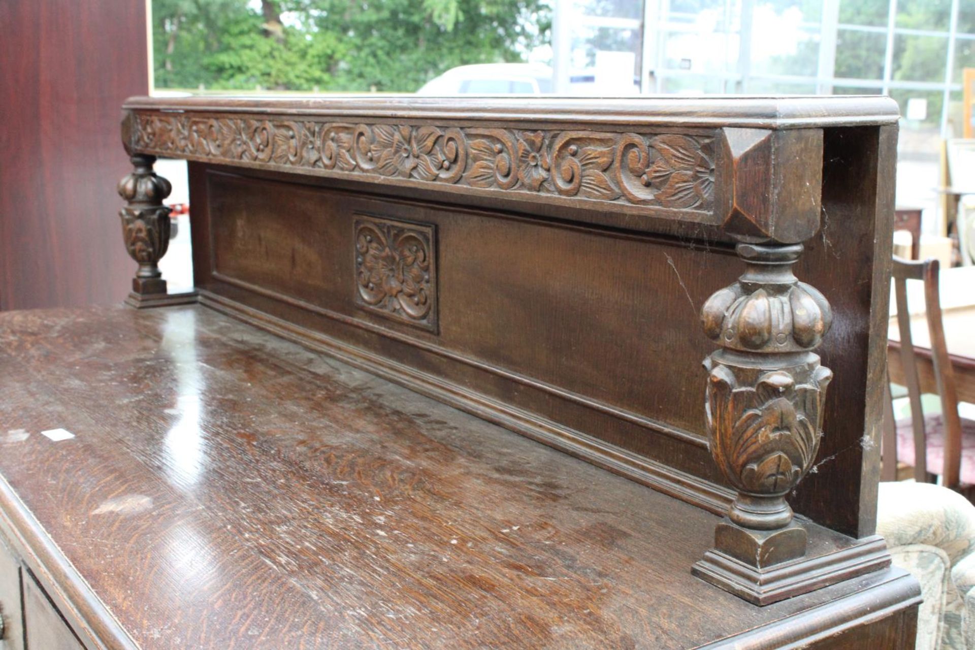 AN EARLY 20TH CENTURY OAK JACOBEAN STYLE SIDEBOARD, 60" WIDE, BEARING A. MARKS & SONS LTD ( - Image 2 of 3