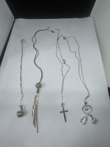 FOUR SILVER NECKLACES WITH PENDANTS