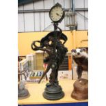 A JULIANA COLLECTION QUARTZ RESIN FIGURAL SWING PENDULUM CLOCK