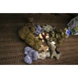 A COLLECTION OF SOFT TOYS TO INCLUDE TEDDIES, ETC