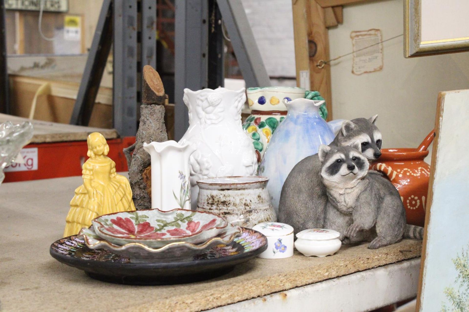 A QUANTITY OF CERAMICS AND CHINA TO INCLUDE, VASES, JUGS, PLATES, RACCOON FIGURE, PILL BOXES, ETC