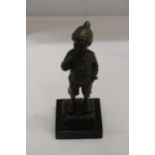 A BRONZE BOY SMOKING A CIGAR ON A MARBLE BASE - SIGNED