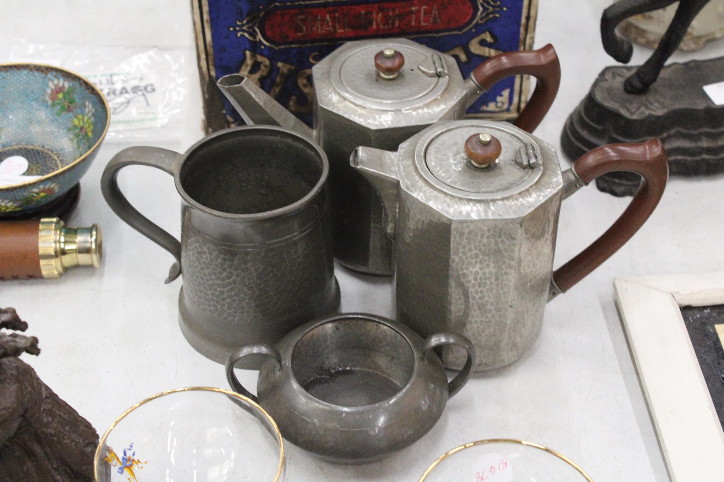 FOUR ITEMS OF TUDRIK BEATEN PEWTER BY LIBERTYS OF LONDON