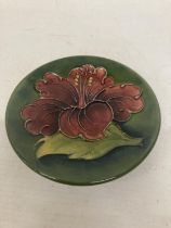 A SMALL MOORCROFT HIBISCUS PATTERN PIN DISH