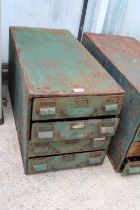 A VINTAGE METAL FOUR DRAWER CABINET WITH INDIVIUAL INTERNAL SECTIONS