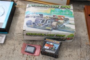 A SCALETRIX 200 MODEL RACING SET, A SCALETRIX PITSTOP AND CREW AND A GARMIN SATNAV