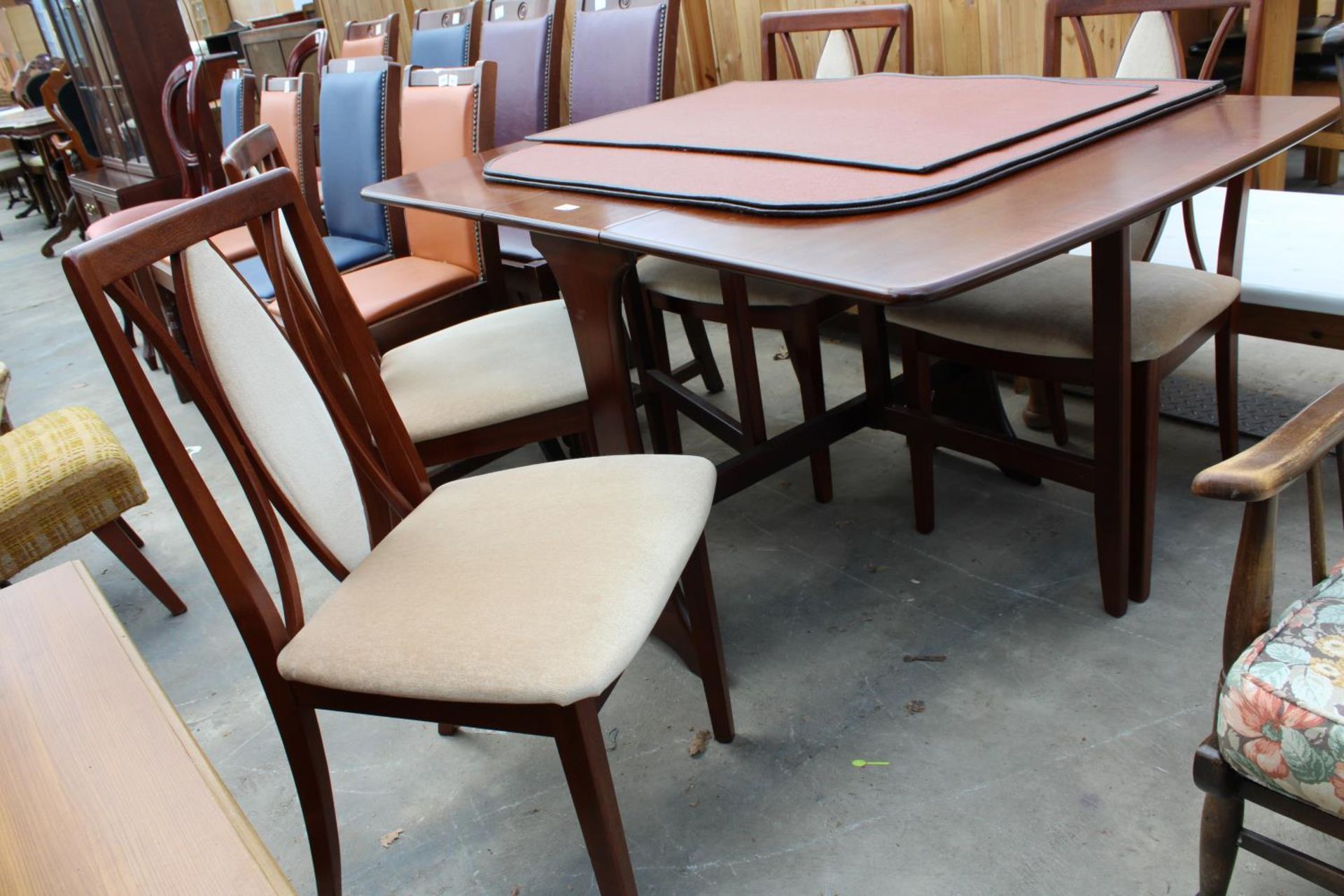A MAHOGANY AND CROSSBANDED DROP-LEAF DINING TABLE AND FOUR CHAIRS - Image 2 of 7
