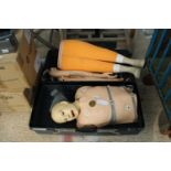 A CRASH TEST DUMMY IN A CARRY CASE