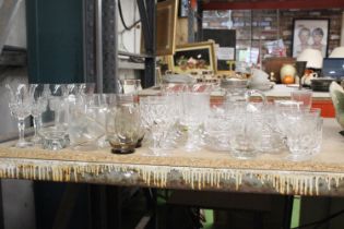 A QUANTITY OF GLASSES TO INCLUDE WINE, SHERRY, TUMBLERS, WHISKY, DESSERT BOWLS, ETC