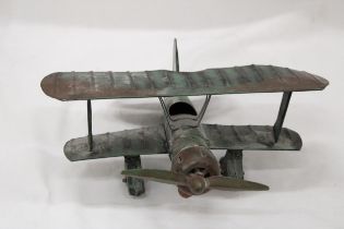 A U.S.A TIN PLATE BI-PLANE APPROXIMATELY 13CM HIGH BY 23CM LONG