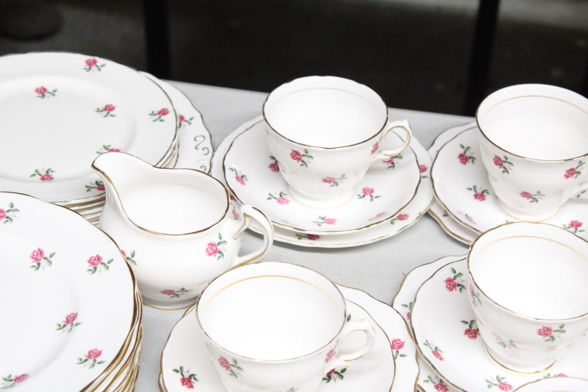 A VINTAGE COLCLOUGH CHINA TEASET, WITH ROSE PATTERN TO INCLUDE PLATES, CREAM JUGS, A SUGAR BOWL, - Image 4 of 5