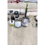 AN ASSORTMENT OF ITEMS TO INCLUDE TWO JUICERS, A GEORGE FORMAN AND A GTECH VACUUM ETC