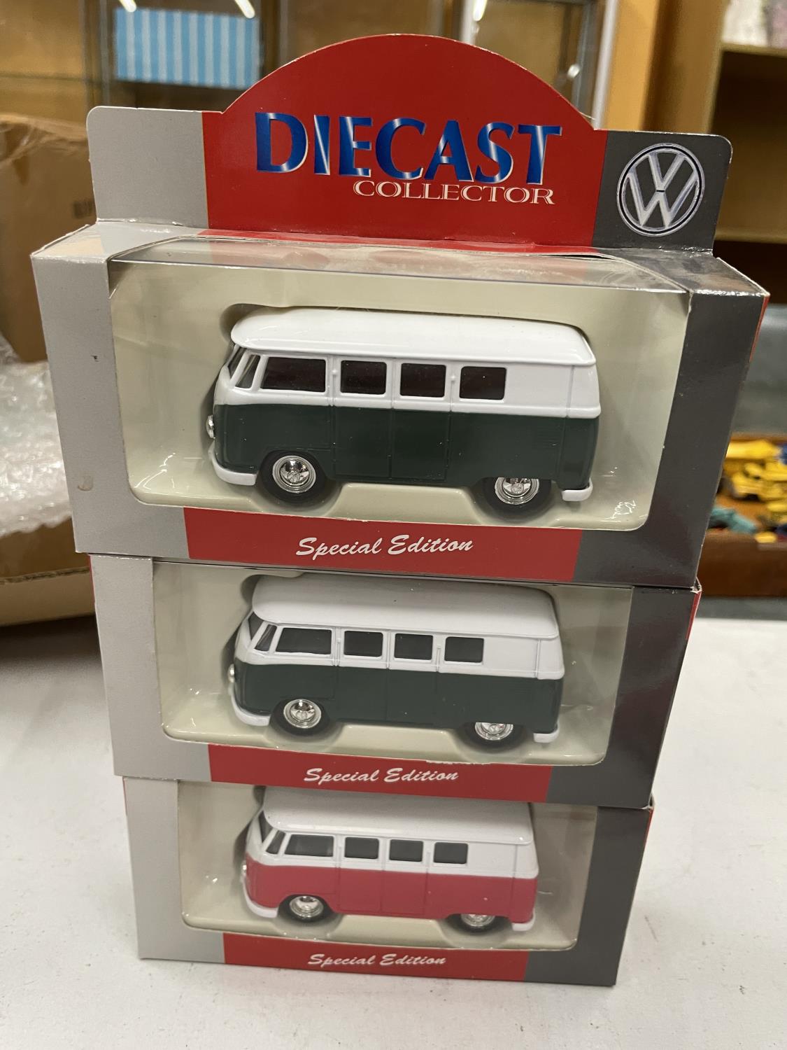 THREE BOXED DIECAST VW COLLECTOR CAMPER VANS WITH A FURTHER 3 UNBOXED VW BEETLES - Image 2 of 5