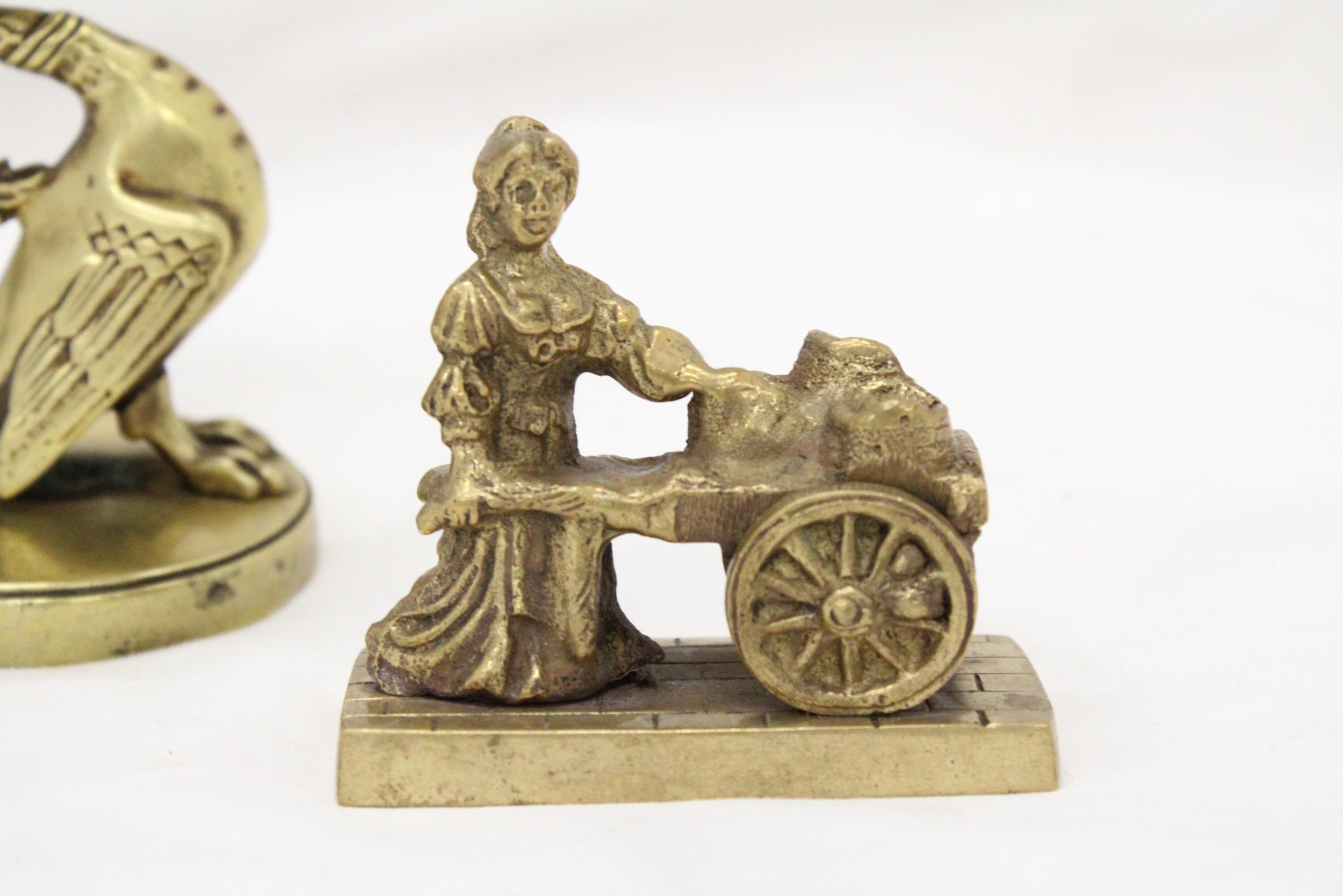 A VINTAGE BRASS GRYPHON CANDLESTICK PLUS A MOLLY MALONE FIGURE - Image 2 of 3