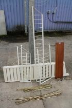 A QUANTITY OF STAPLES LADDERAX BRASS RODS AND BRACKETS ETC