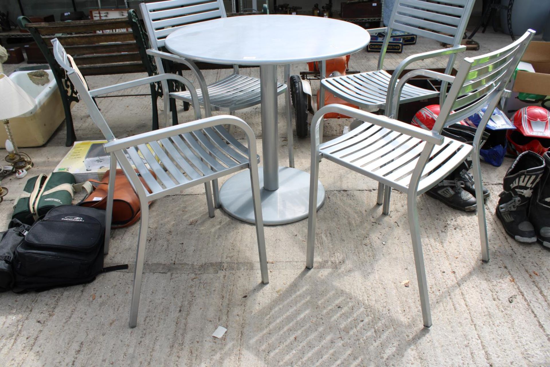 A METAL BISTRO TABLE AND FOUR MATCHING CHAIRS - Image 2 of 2