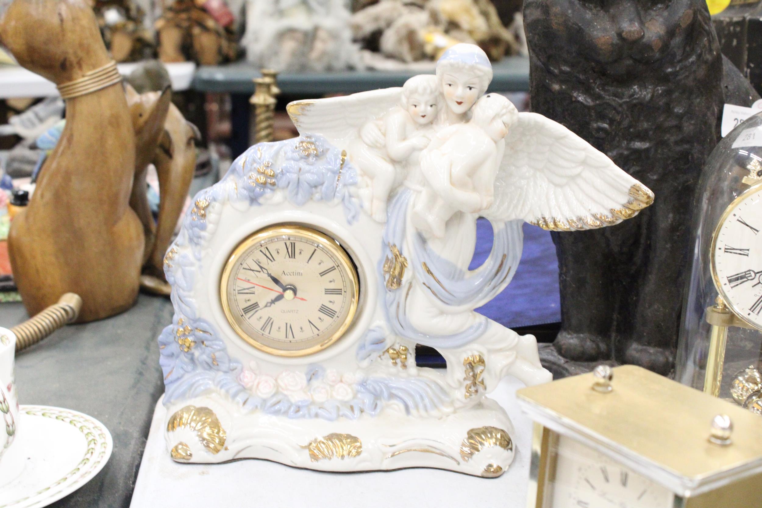 TWO MANTLE CLOCKS TO INCLUDE A CERAMIC ANGEL WITH CHILDREN, PLUS A CARRIAGE CLOCK - Image 3 of 5