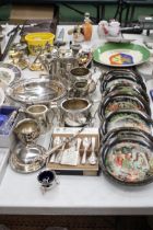 A MIXED LOT OF SILVER PLATE TO INCLUDE A TEAPOT, JUGS, CANDELABRA ETC