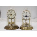 TWO BRASS ANNIVERSARY CLOCKS WITH GLASS DOMES