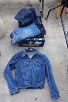 A LARGE ASSORTMENT OF DENIM CLOTHING TO INCLUDE A LEVIS JACKET AND A PAIR OF CALVIN KLEIN JEANS ETC