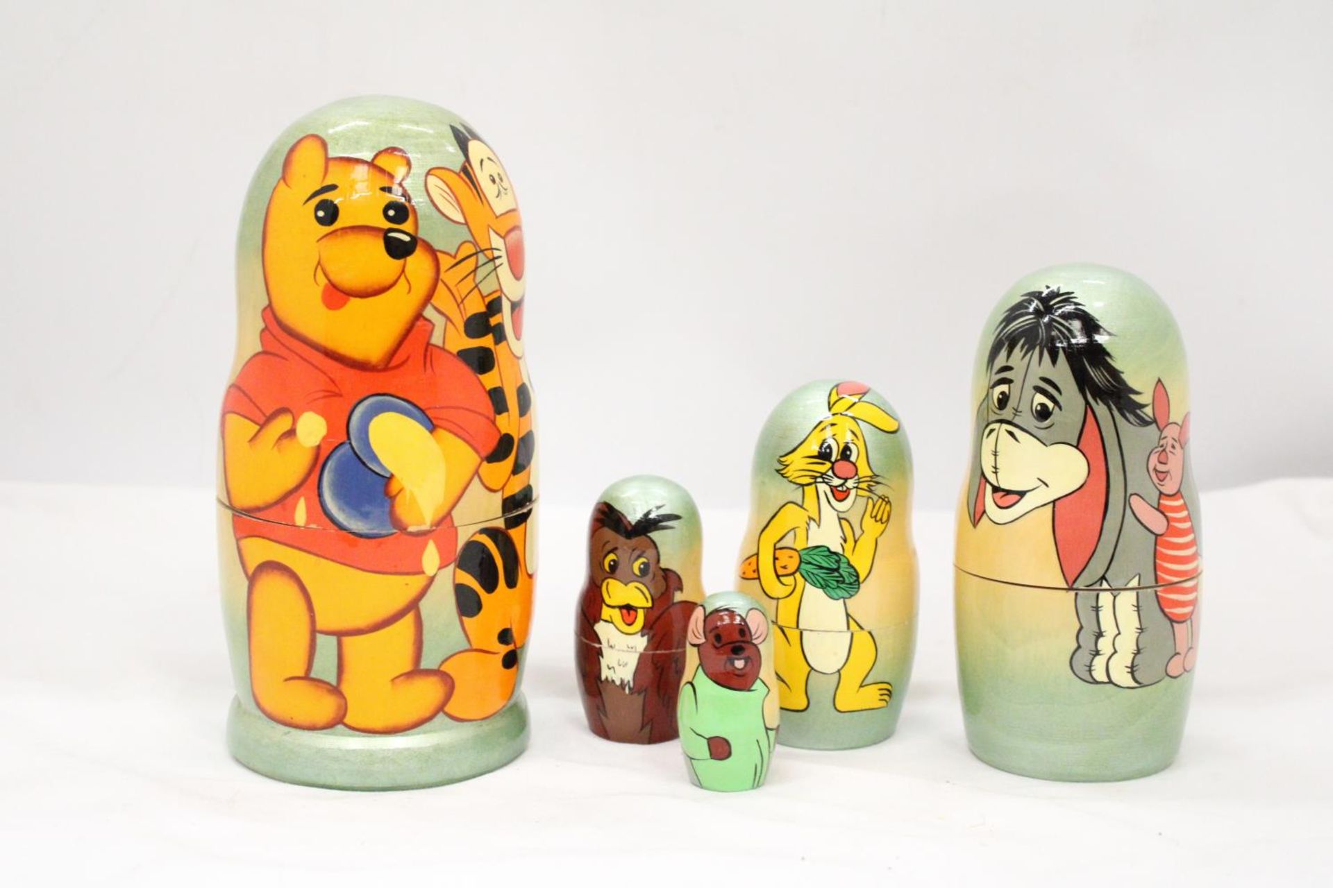 A WINNE THE POOH AND PALS RUSSIAN DOLL - APPROXIMATELY 18CM HIGH