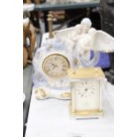 TWO MANTLE CLOCKS TO INCLUDE A CERAMIC ANGEL WITH CHILDREN, PLUS A CARRIAGE CLOCK