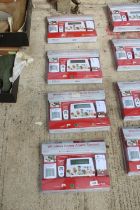 FOUR AS NEW AND BOXED WIRELESS HOME ALARM SYSTEMS