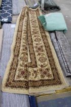 A BELIEVED AS NEW MADE IN TURKEY CREAM PATTERNED RUG (305CM x 430CM)