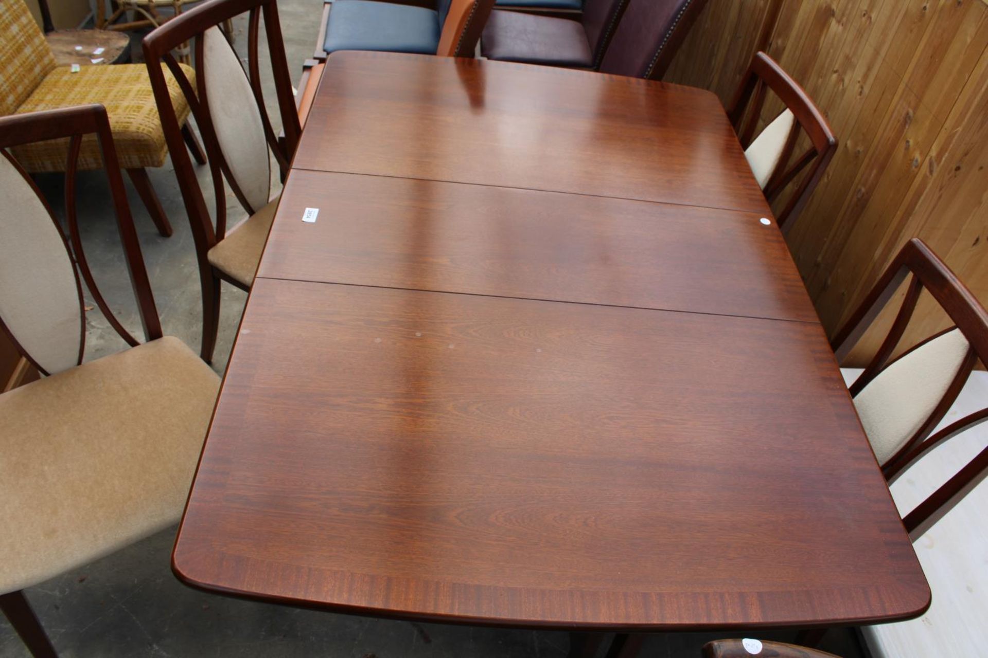 A MAHOGANY AND CROSSBANDED DROP-LEAF DINING TABLE AND FOUR CHAIRS - Image 4 of 7