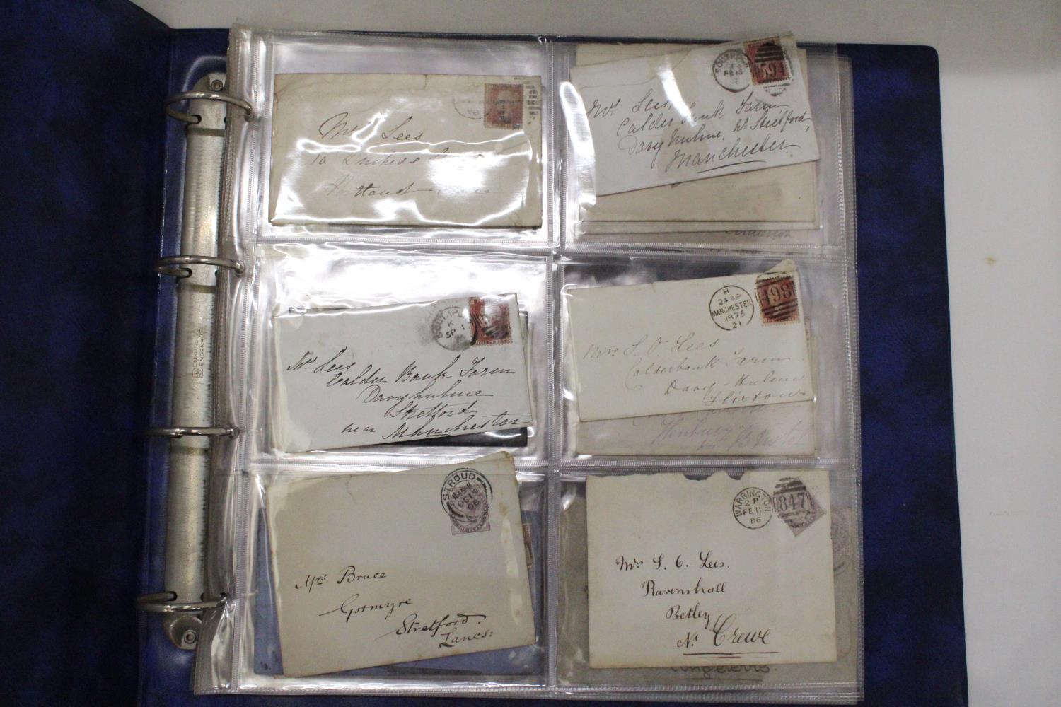 A SELECTION OF VICTORIAN ENVELOPES IN A BLUE BINDER WITH FIFTY PENNY RED STAMPS - Image 2 of 6