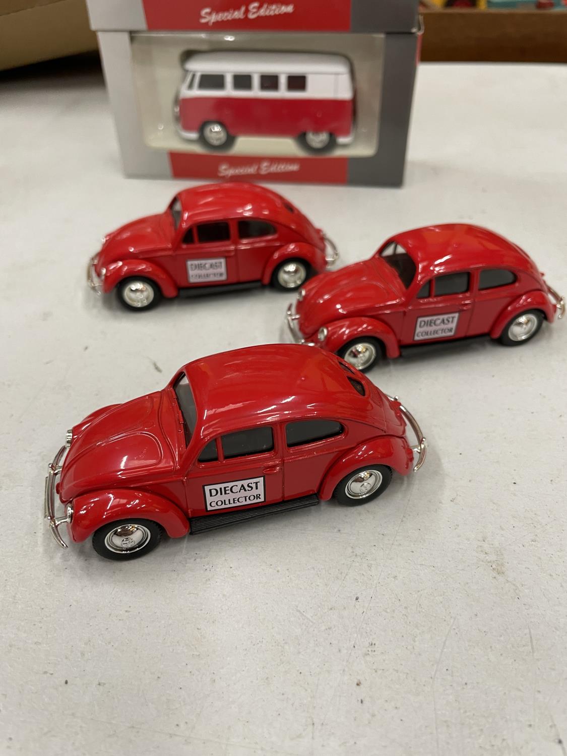 THREE BOXED DIECAST VW COLLECTOR CAMPER VANS WITH A FURTHER 3 UNBOXED VW BEETLES - Image 3 of 5