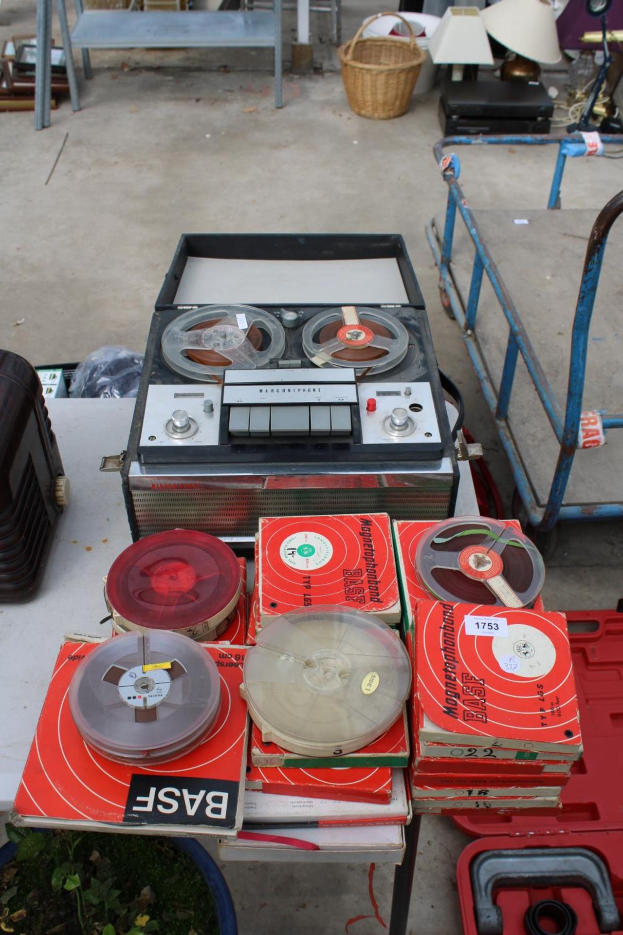 A MARCONIPHONE TAPE TO TAPE PLAYER AND AN ASSORTMENT OF REELS
